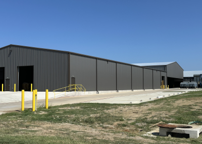 External view of a grey manufacturing/industrial facility