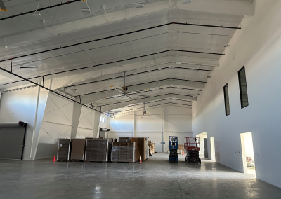 A new industrial warehouse with high ceilings.