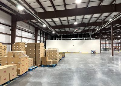 Spacious industrial warehouse interior under construction